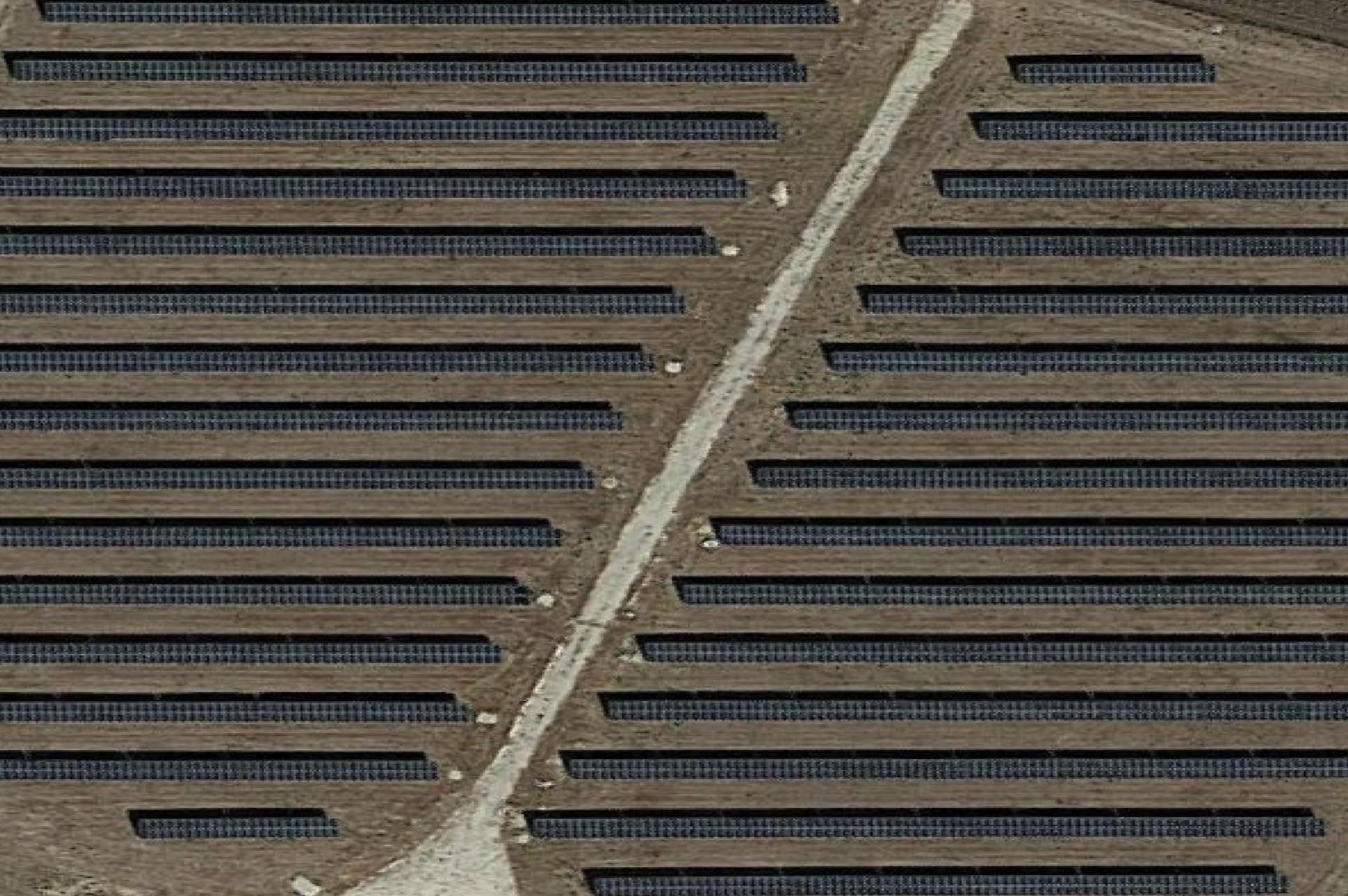 Aerial photograph of 4MW Sycamore Energy solar installation showing organised rows of solar panels
